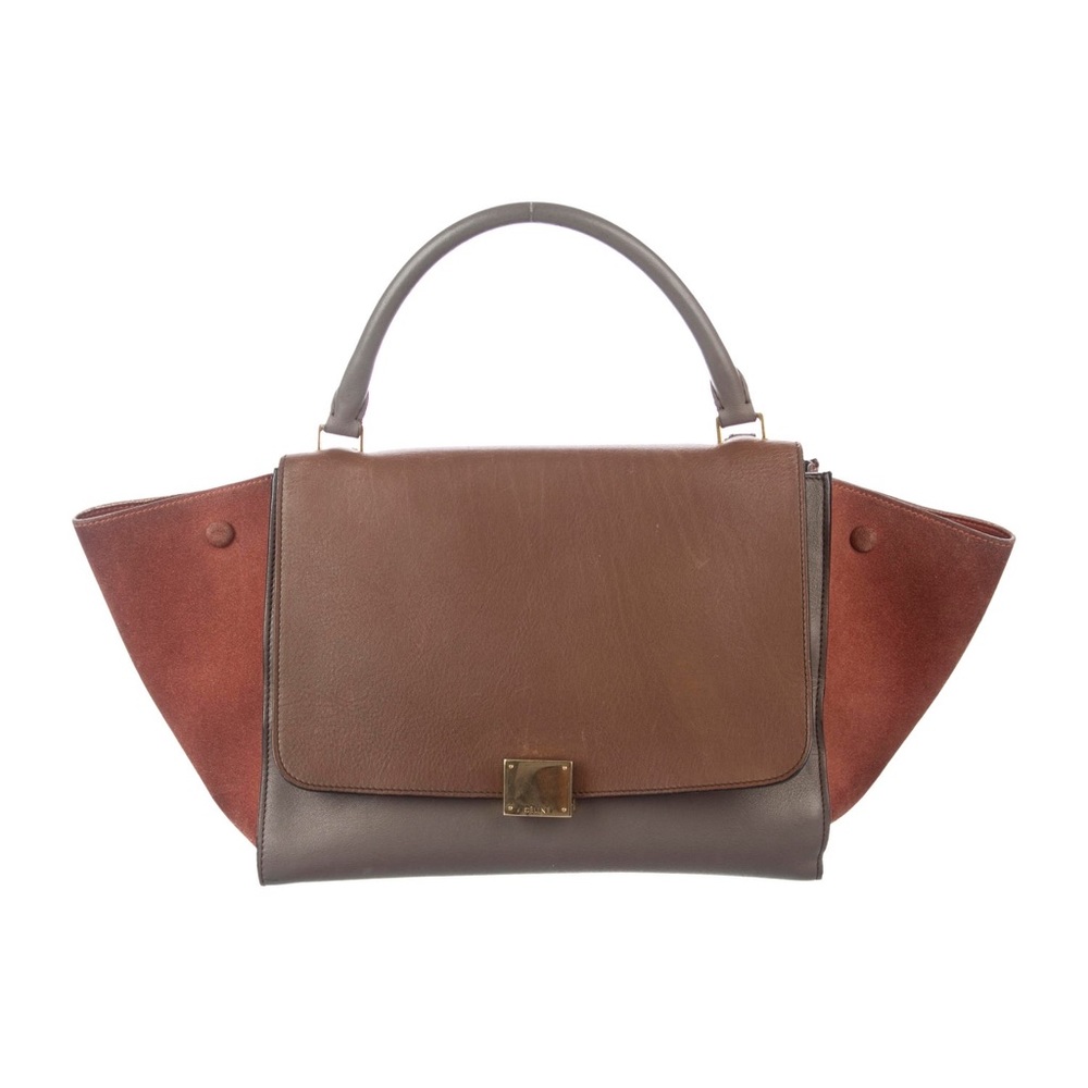 Gently used medium large trapeze bag with some moderate scuffing & discoloration